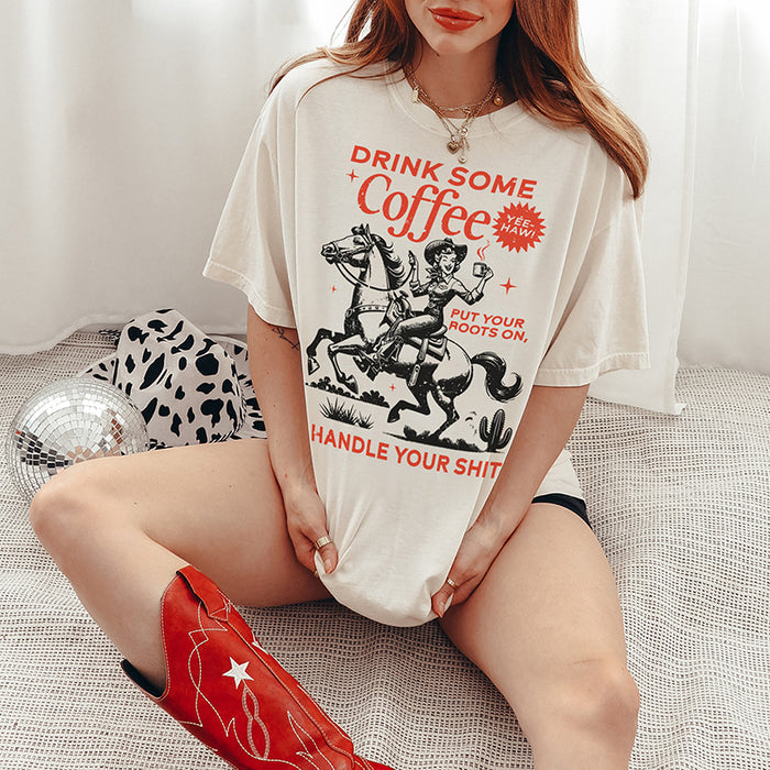 Model in cowboy boots — relaxed western shirt for women with bold coffee print