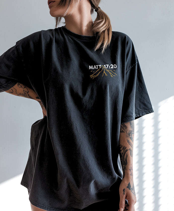 Front view of Faith Can Move Mountains tee in black — Christian graphic t-shirt for men and women