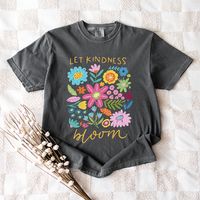 Flat lay of Let Kindness Bloom tee in pepper — kindness-themed floral shirt for women