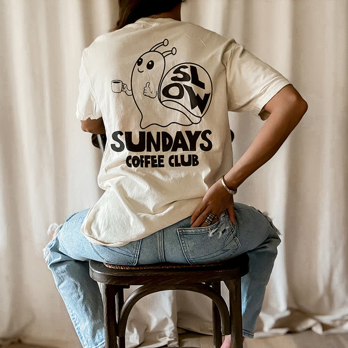 Back view of model in ivory tee — unisex coffee graphic shirt