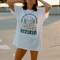 Model wearing river-inspired faith tee outdoors — Christian motivational shirt for nature lovers